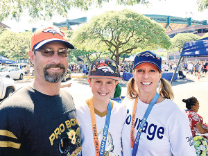 Kathy Weber’s husband, Ty, and son, Coy, join her at the Pro Bowl.